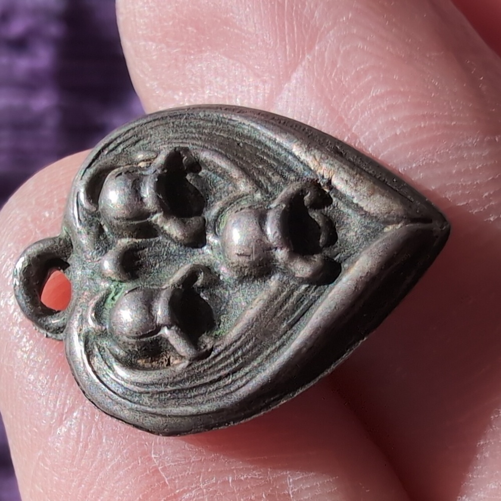 Antique sterling silver puffed heart charm